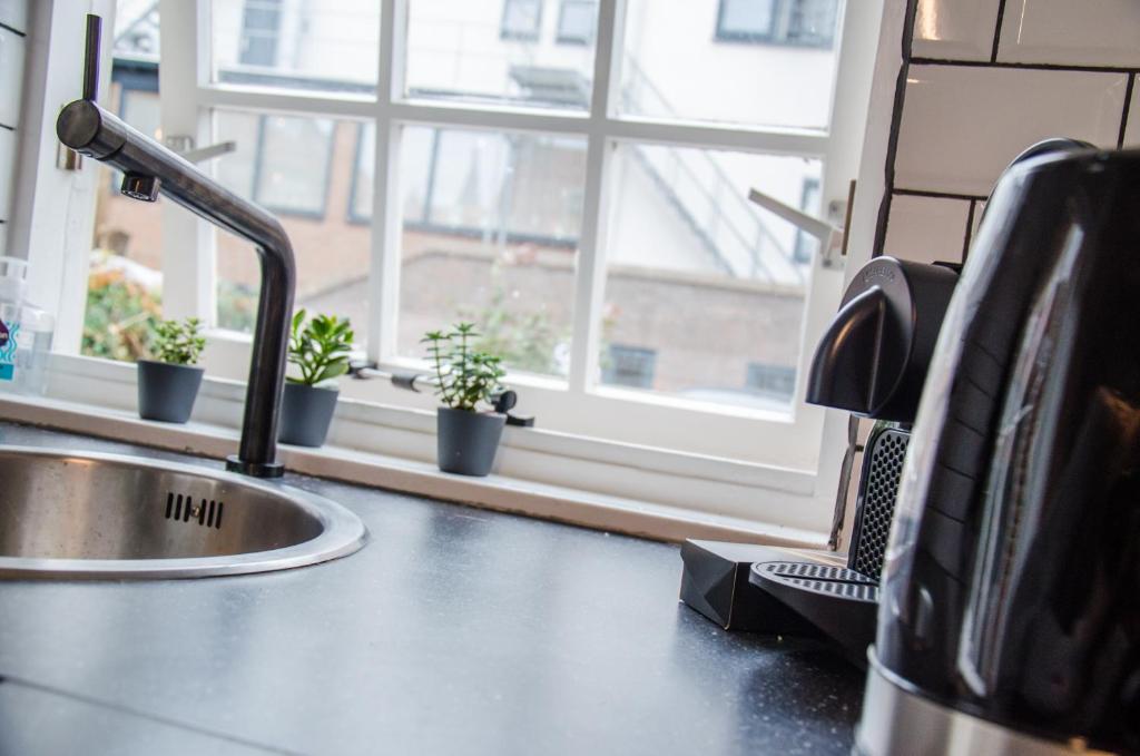 Dorpsplein, ruime woning incl. parkeerplaats room 5